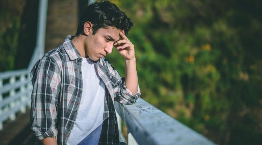 Isolated teen boy - isolation can be one of the reasons teens use drugs